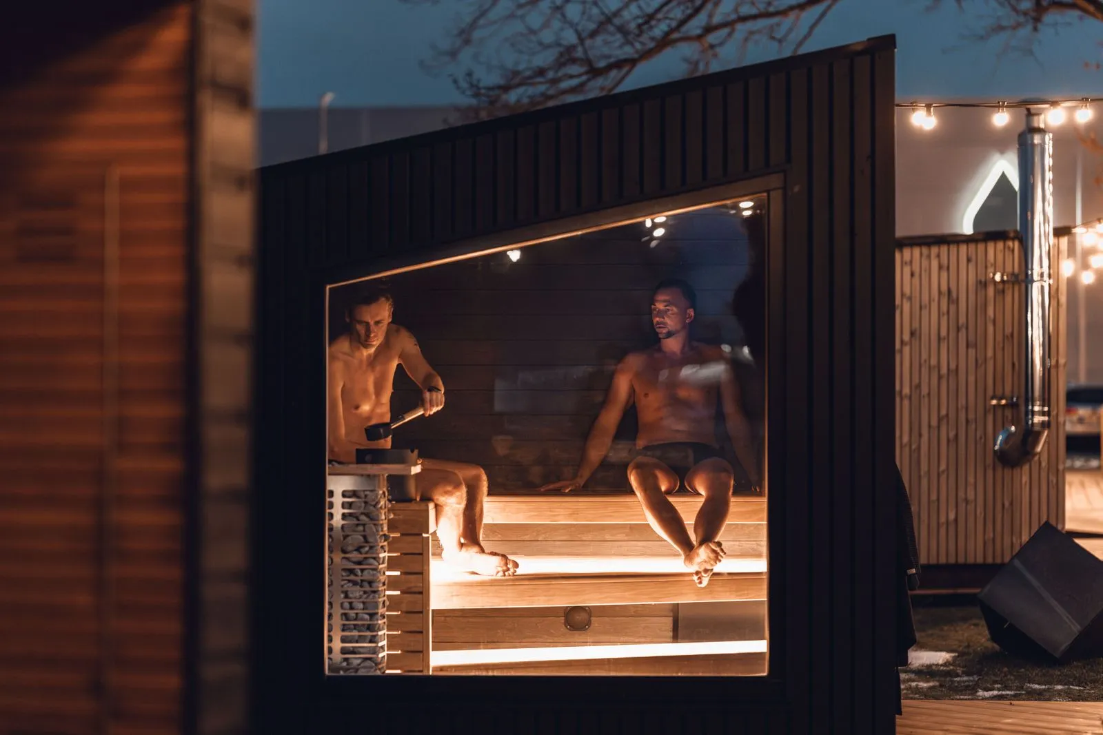 A sauna being installed with electrical and base work underway