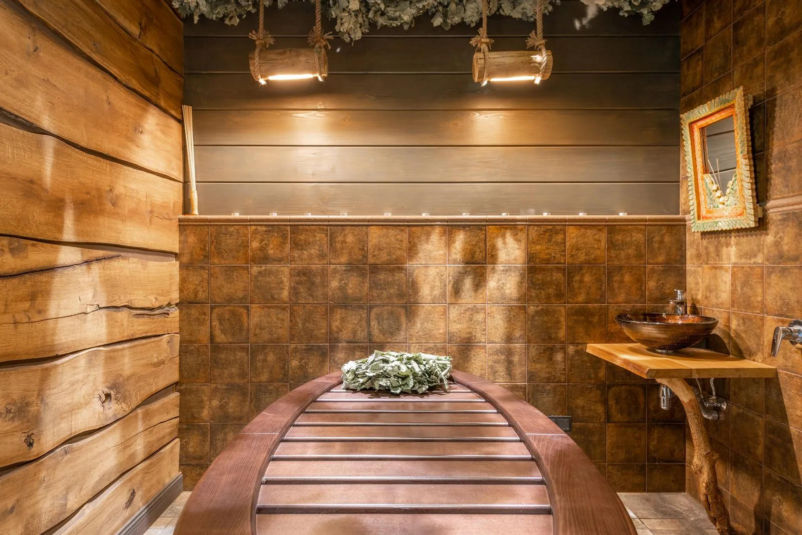 Interior of a compact sauna showing bench layout and proportions